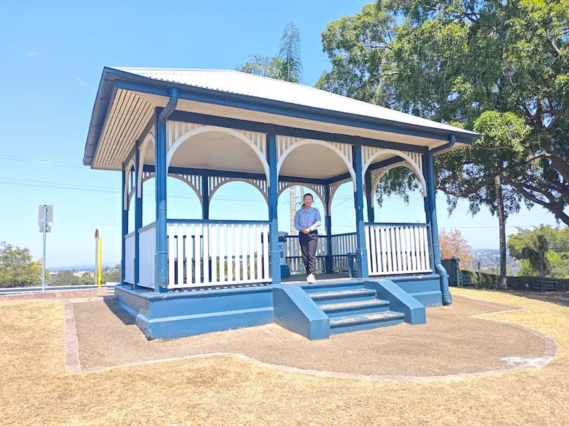 Dr Angel from Angel Chiropractic standing at Highgate Hill Park, representing her dedication to caring for the Highgate Hill community.