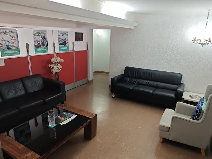 Angel Chiropractic Brisbane waiting area with comfortable seating, natural light, and relaxing décor for patients before chiropractic treatments