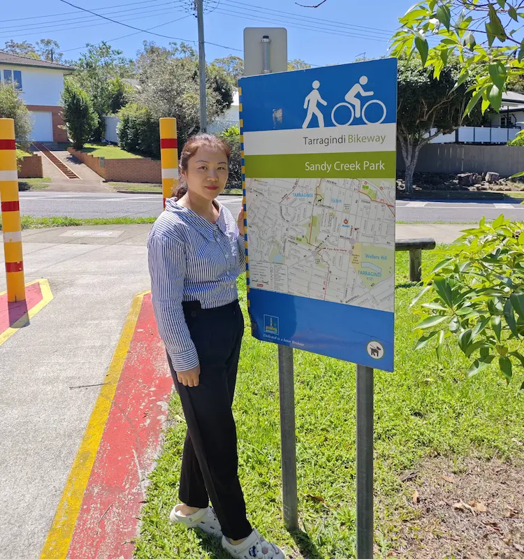Dr Angel from Angel Chiropractic at Sandy Creek Park in Tarragindi, promoting local chiropractic services for Tarragindi residents.