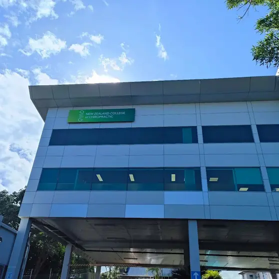Dr Angel Back from New Zealand at the New Zealand College of Chiropractic on a sunny day