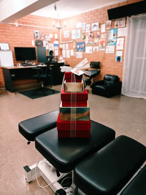 Patient gift placed on chiropractic table at Angel Chiropractic Brisbane